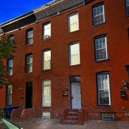Rent this 3 bed townhouse on 1740 South Charles Street in Baltimore, MD 21230