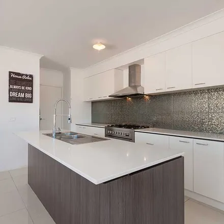 Rent this 4 bed apartment on Trillium Boulevard in Mickleham VIC 3064, Australia