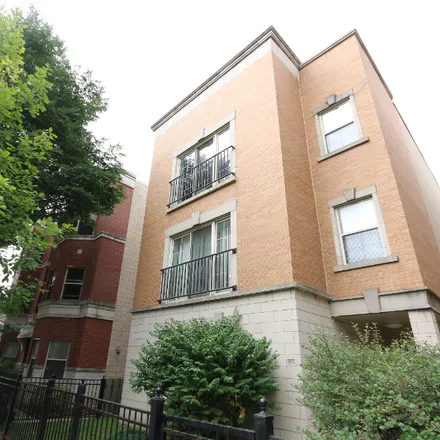 Rent this 4 bed condo on 1034 S Racine Ave