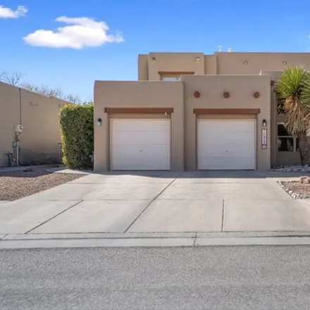 Buy this 4 bed house on 10967 Farola Drive Northwest in Albuquerque, NM 87114