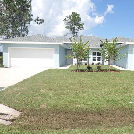 Rent this 3 bed duplex on 92 Lynbrook Drive in Palm Coast, FL 32137