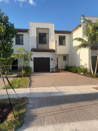 Rent this 3 bed townhouse on 7-Eleven in 1 West Flagler Street, Miami