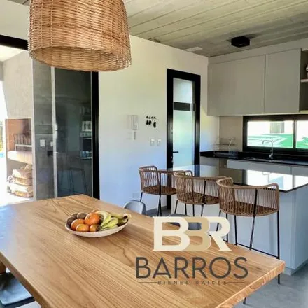 Buy this 3 bed house on Jardín Colegio San Patricio in Carola Lorenzini (M) / Alcorta (GR), Los Artistas