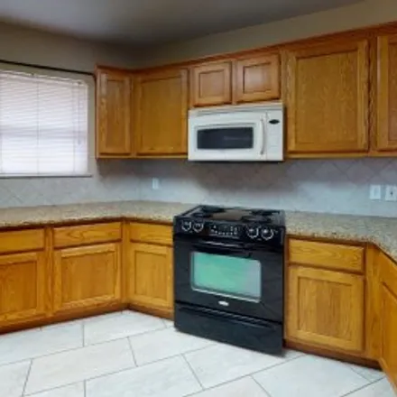 Rent this 3 bed apartment on 822 Azalea Court in Eastmark, College Station