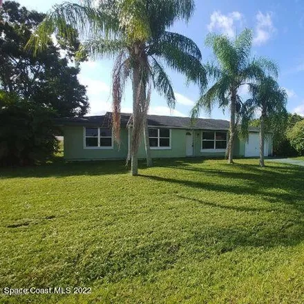 Buy this 3 bed house on 1946 Academy Street Northeast in Palm Bay, FL 32905
