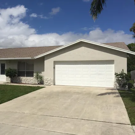 Buy this 3 bed house on 4625 Blue Pine Circle in Palm Beach County, FL 33463