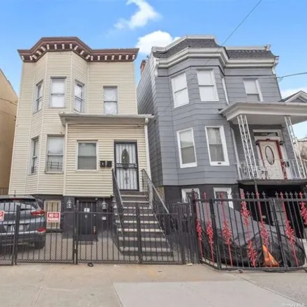 Buy this 9 bed house on 2065 Valentine Avenue in New York, NY 10457