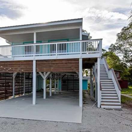 Buy this 4 bed house on 12601 Bayshore Avenue in Cedar Key, FL 32625