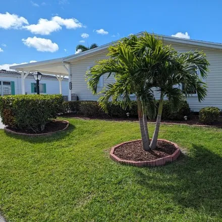 Buy this studio apartment on 8401 Labelia Court in Saint Lucie County, FL 34952