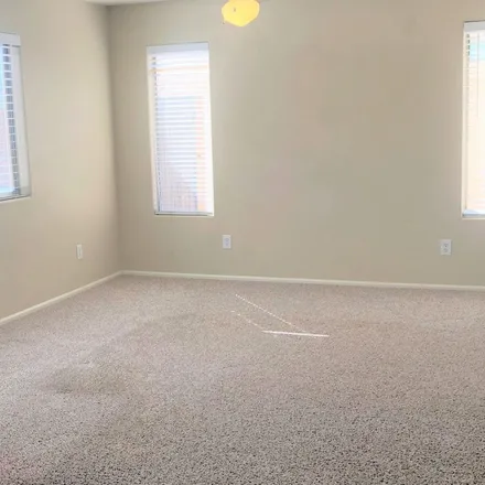 Rent this 4 bed apartment on 957 East Dragon Fly Road in San Tan Valley, AZ 85143