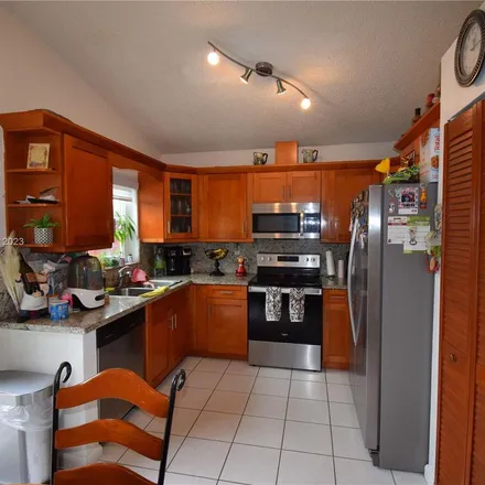 Rent this 3 bed apartment on 10038 Southwest 166th Avenue in Miami-Dade County, FL 33196