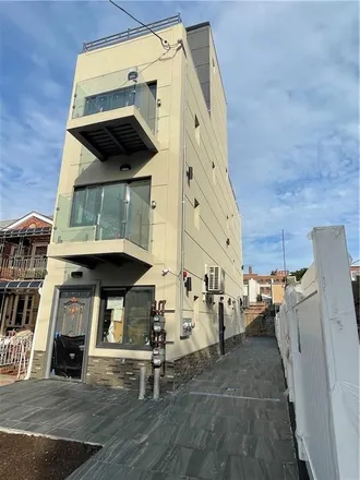 Buy this 4 bed townhouse on 135 Bay 47th Street in New York, NY 11214
