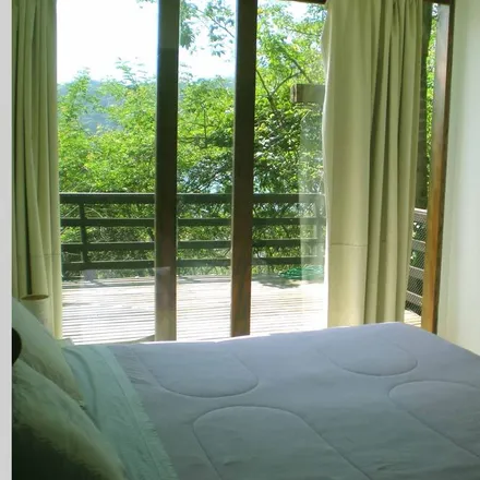 Rent this 4 bed condo on São Sebastião in Região Metropolitana do Vale do Paraíba e Litoral Norte, Brazil