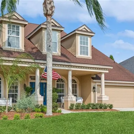Buy this 4 bed house on 3055 Northfield Drive in East Lake, FL 34688