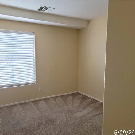 Rent this 3 bed apartment on 5662 la Perla Court in Whitney, NV 89122