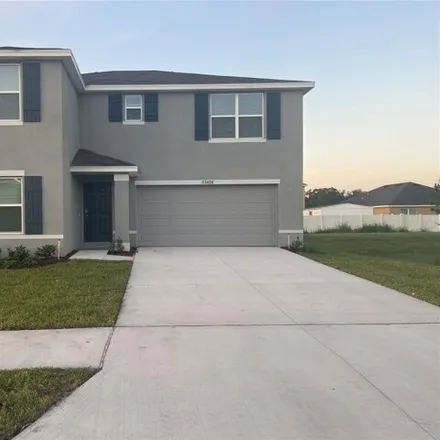 Rent this 4 bed house on Doveland Drive in Pasco County, FL 33541