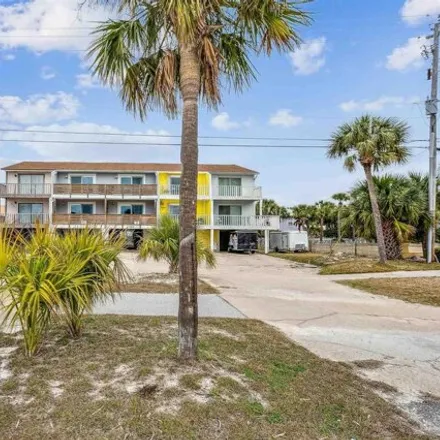 Buy this 4 bed house on Gulf Properties Realty Inc in 8460 Gulf Boulevard, Navarre