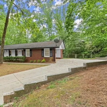 Buy this 4 bed house on 5028 Wickford Way in Dunwoody, GA 30338