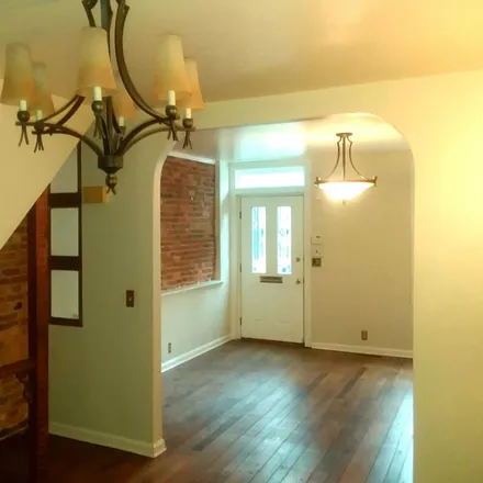 Rent this 2 bed townhouse on 637 North Paca Street in Baltimore, MD 21201