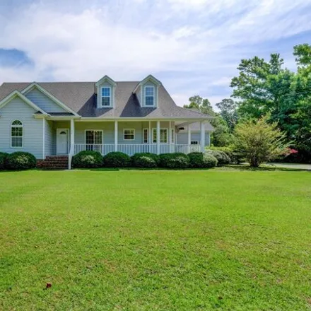 Rent this 3 bed house on 1030 Country Club Drive in Kings Landing, Pender County