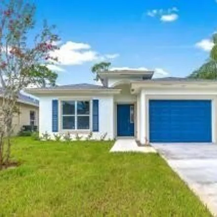 Buy this 4 bed house on 895 Fitch Drive in Palm Beach County, FL 33415