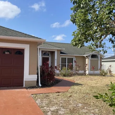 Buy this 3 bed house on 676 Southwest McComb Avenue in Port Saint Lucie, FL 34953