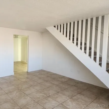 Rent this 3 bed condo on 1641 Turquoise Rd Apt F in Bullhead City, Arizona