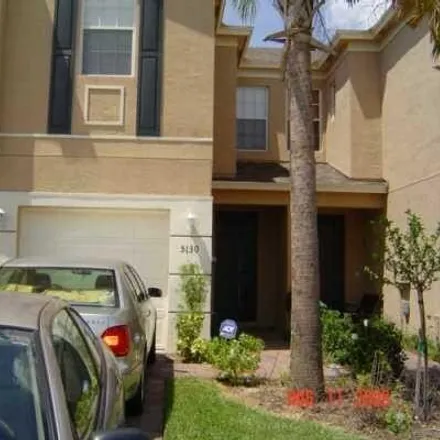 Rent this 3 bed townhouse on 5132 White Oleander in Palm Beach County, FL 33415