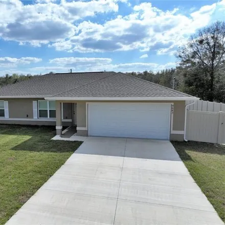 Rent this 3 bed house on 30 Bahia Pass Trail in Silver Springs Shores, Marion County