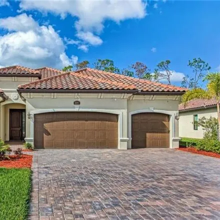 Rent this 4 bed house on 9399 Vercelli Court in Lely Golf Estates, Collier County