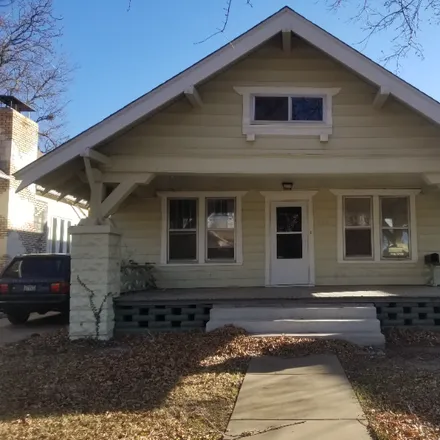 Rent this 3 bed house on 218 S. Erie