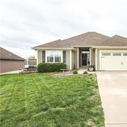 Buy this 4 bed house on 1398 Northwest Honeylocust Court in Grain Valley, MO 64029