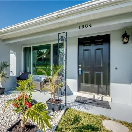 Buy this 4 bed house on 1678 Carter Place in Fort Myers, FL 33901