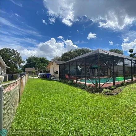 Buy this 3 bed house on 1120 Northwest 93rd Avenue in Pembroke Pines, FL 33024