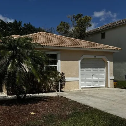 Buy this 3 bed house on Village Golf Club in 122 Country Club Drive, Royal Palm Beach