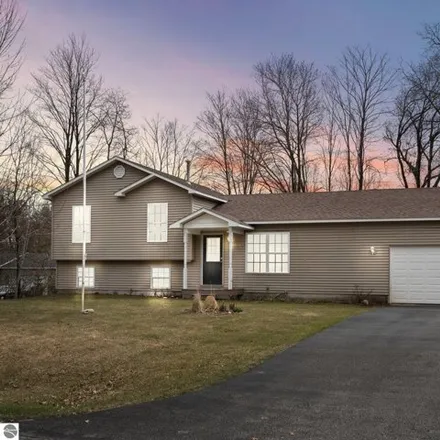 Buy this 3 bed house on 10019 Betsie Creek Drive in Interlochen, Grand Traverse County