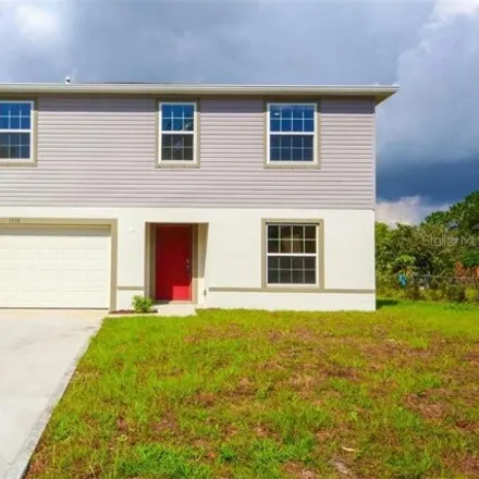 Rent this 4 bed house on 1938 Tranter Avenue Southeast in Palm Bay, FL 32909
