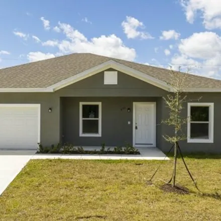 Rent this 4 bed house on 969 Wellington Street Southwest in Palm Bay, FL 32908