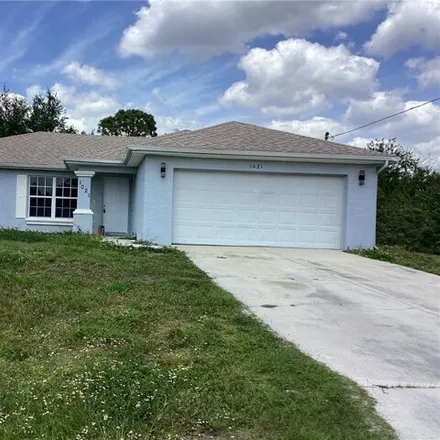 Rent this 3 bed house on 1043 Bernick Lane in Lehigh Acres, FL 33974