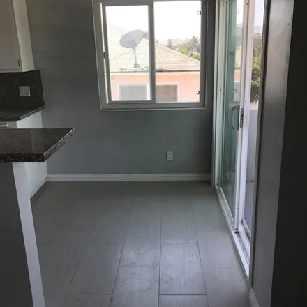 Rent this 2 bed apartment on 2060 South Longwood Avenue in Los Angeles, CA 90016