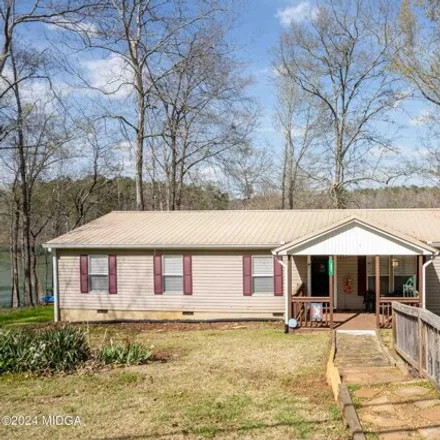 Buy this 4 bed house on 399 Twi Light Shores Road in Putnam County, GA 31024