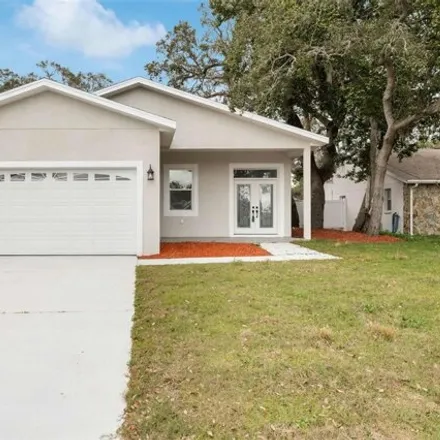 Buy this 3 bed house on 5607 Cheyenne Drive in Holiday, FL 34690