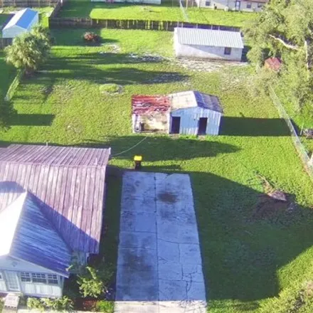 Buy this 2 bed house on 717 Virginia Avenue in Auburndale, FL 33823