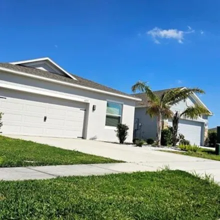 Rent this 4 bed house on Desert Rose Avenue in Osceola County, FL 34758