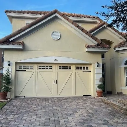 Buy this 4 bed house on 6885 Lucca Street in Orlando, FL 32819