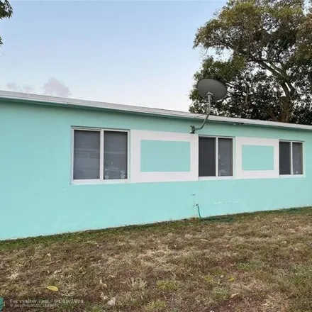 Rent this 3 bed house on 3020 Northwest 5th Street in Browardale, Lauderhill