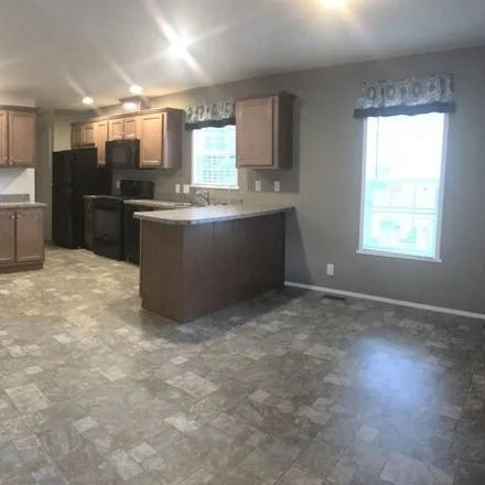 Buy this studio apartment on 13612 Oaktree Court in Grand Haven Charter Township, MI 49417