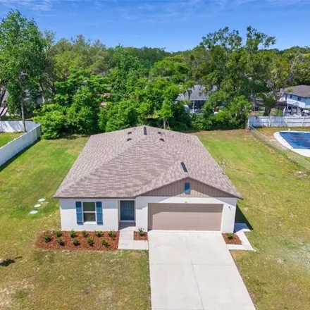 Buy this 4 bed house on 319 Waterfall Drive in Spring Hill, FL 34608
