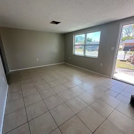Rent this 2 bed apartment on 7437 King Arthur Drive in Jasmine Estates, FL 34668
