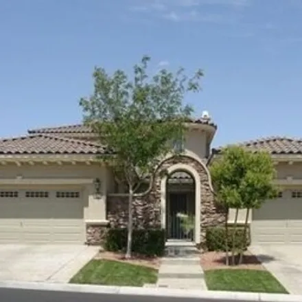 Rent this 4 bed house on 1900 Country Cove Court in Summerlin South, NV 89135